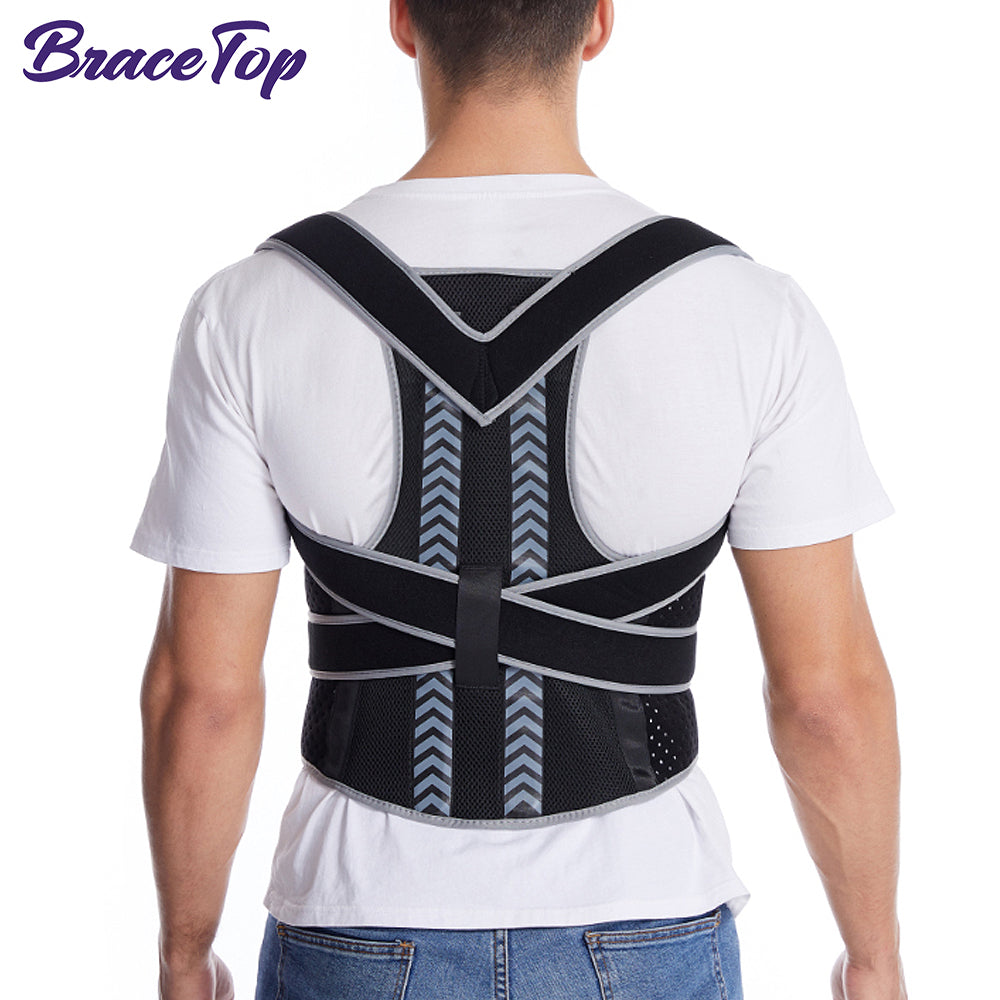 A men wearing a black Posture Corrector for Shoulder Pain and Back Pain with Lumbar Support on a white background